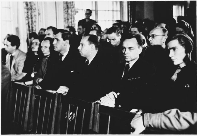 Spectators watch the proceedings at the Sachsenhausen concentration camp war crimes trial in Berlin